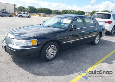 1998 Lincoln Town Car Signature из США, поврежденный, VIN 1LNFM82W4WY732328